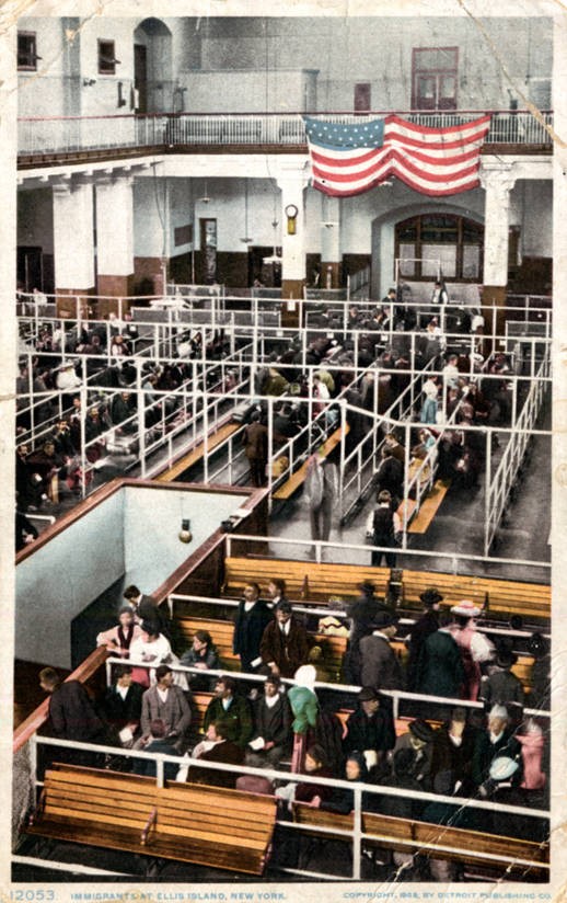 Large Room on Ellis Island With Immigrants