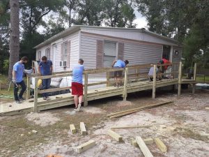 LDS Missionaries at work making a home accessible