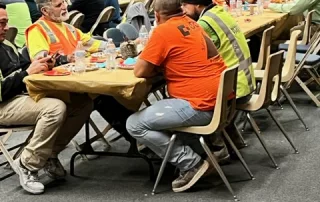 Temple construction workers enjoying dinner